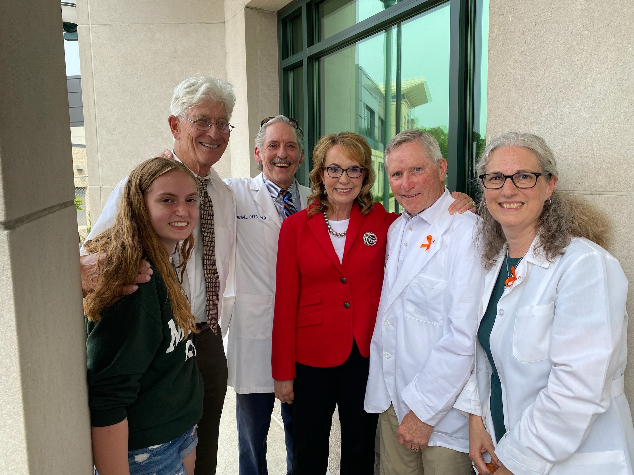 Dr. Jerry Walden with Gabby Giffords at Gov. Whitmer's "red flag law" bill signing